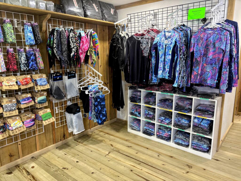 rash guards, dive skins, head bands, and other scuba diving accessories