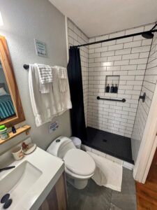 private bathroom in Divemaster Intern room at Cocoview Resort.