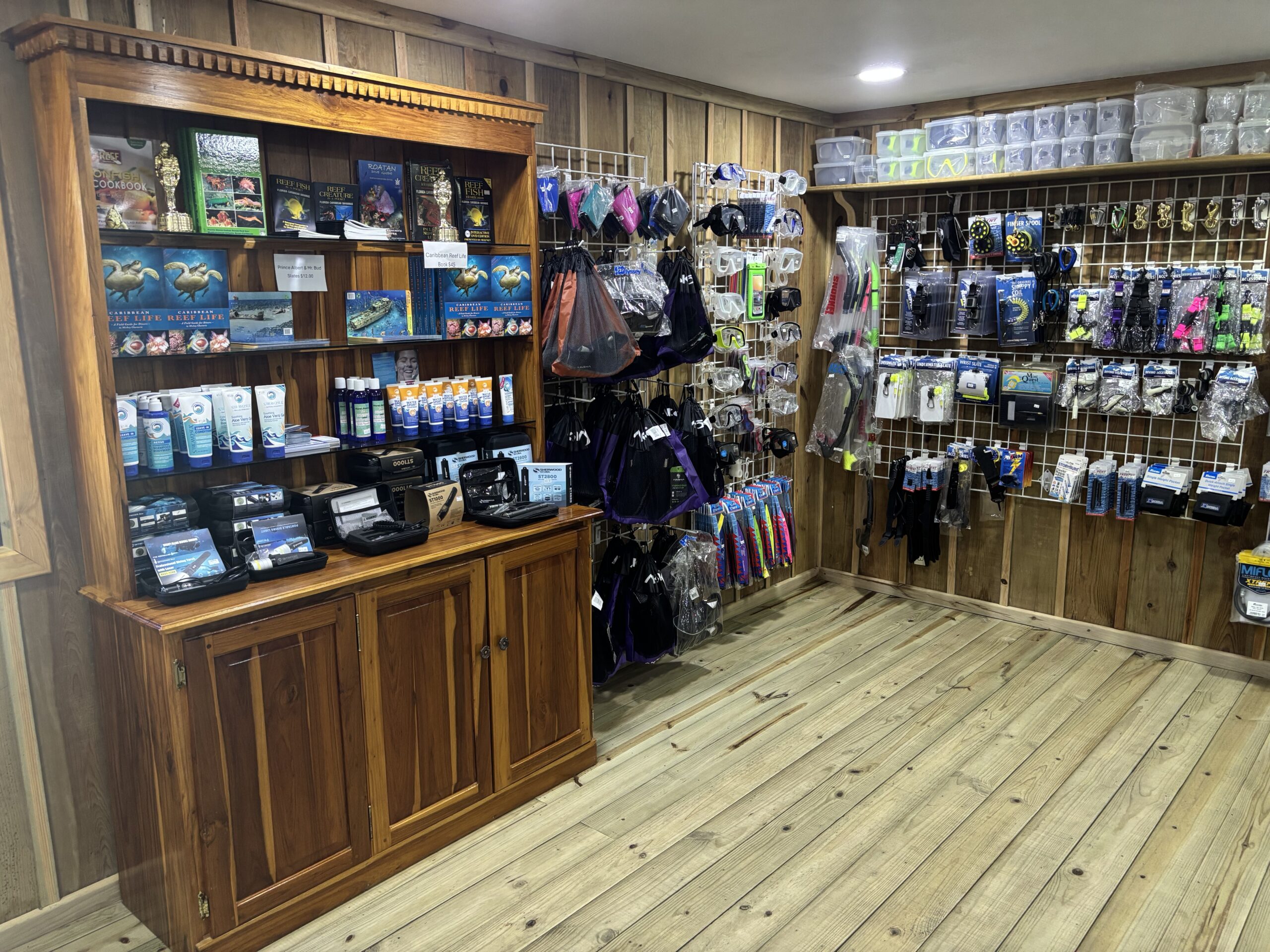 dockside dive center store has books, masks, and many other diving accessories